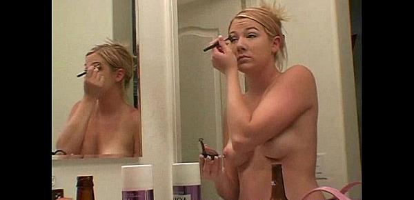  Topless applying makeup